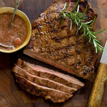grilled flank steak with tomato herb mop sauce