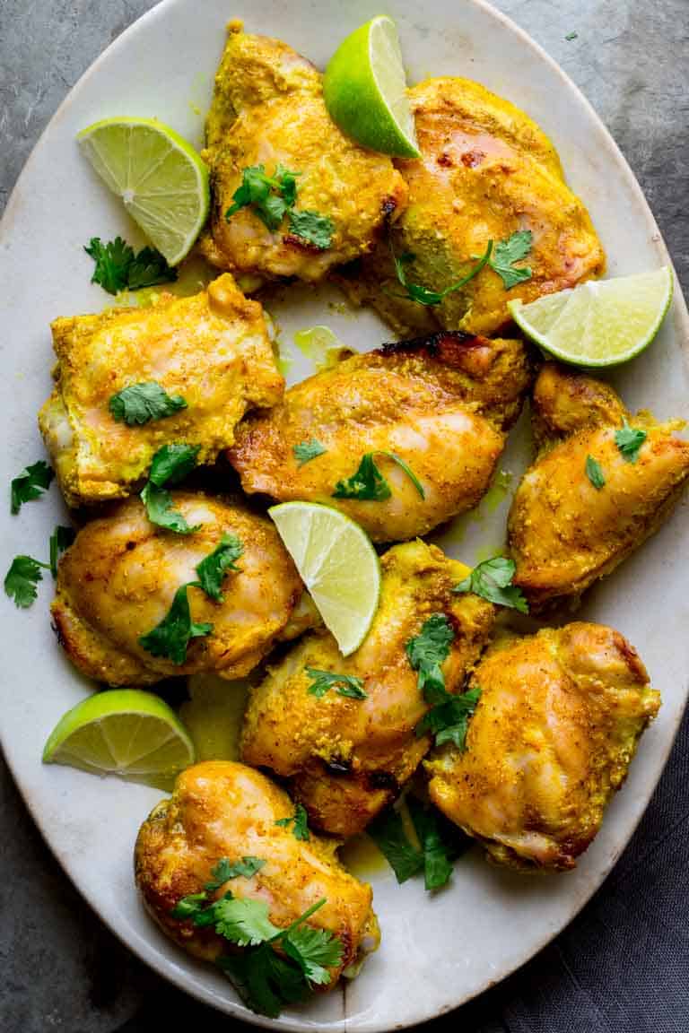 Yogurt Curry Chicken Thighs on a plate 