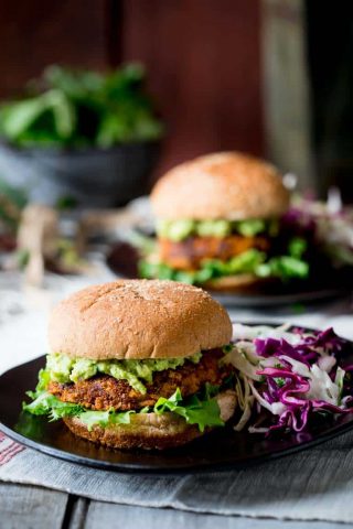 These Southwest Bean Burgers are savory and tender patties of goodness that will satisfy all of your vegetarian comfort food cravings! | Healthy Seasonal Recipes | Katie Webster