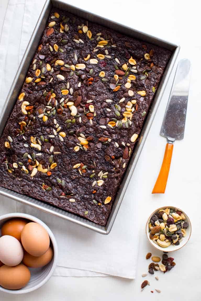 These Fudgy Greek Yogurt Trail Mix Brownies are the perfect treat to take to your next picnic or barbecue. Healthy Seasonal Recipes #brownie #dessert #chocolate #kidfriendly #greekyogurt