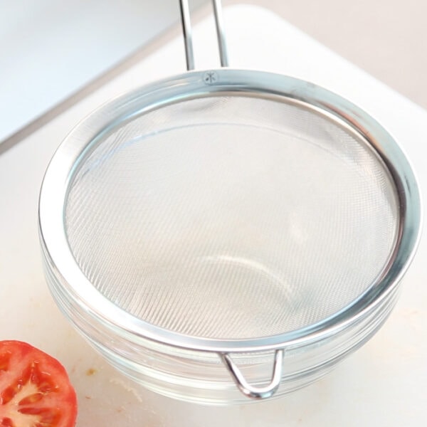 Set a sieve in a large bowl.