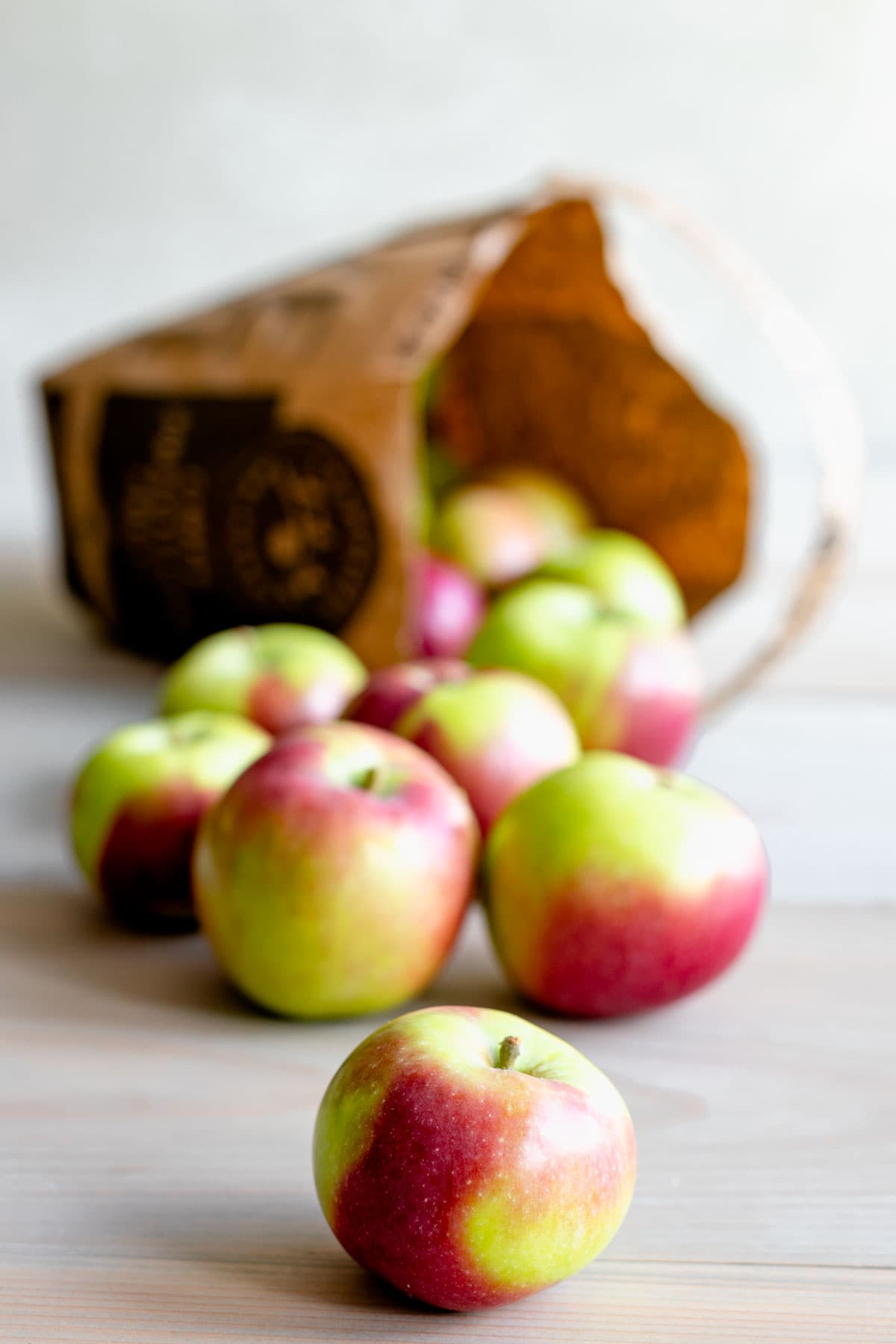 a 1/2 peck tote bag with apples