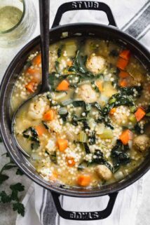 a black Dutch Oven filled with Wedding Soup