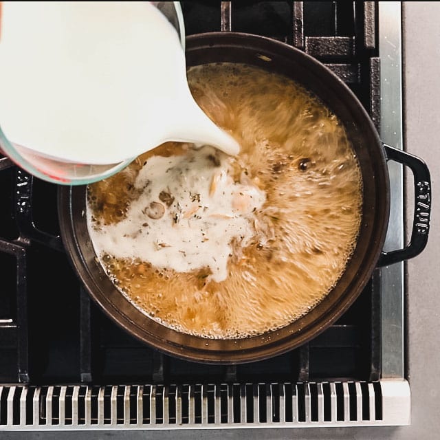 Add milk and return to a simmer, stirring often.