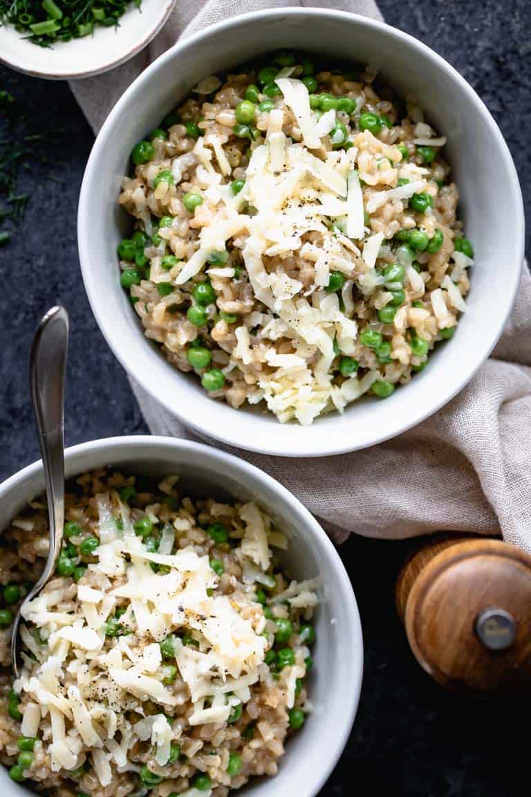 A close-up of two bowls of Brown Rice Risotto