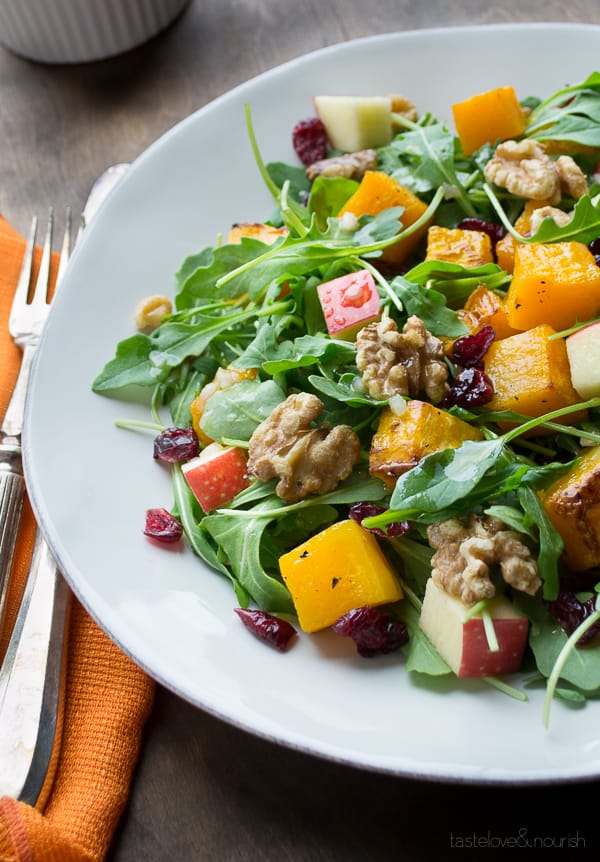 Baby Arugula Salad with roasted butternut squash, apples, cranberries and walnuts .