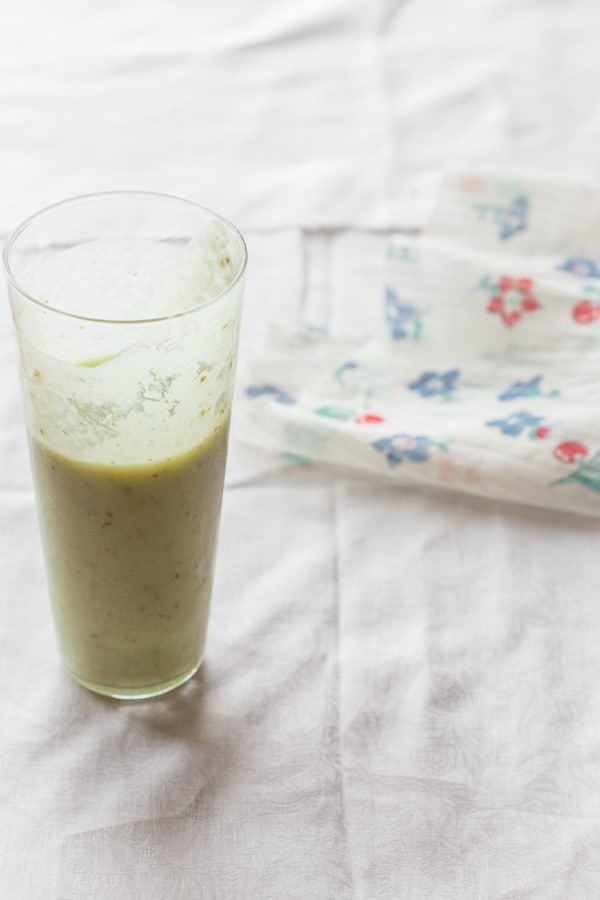 Pear and avocado smoothie in a glass 