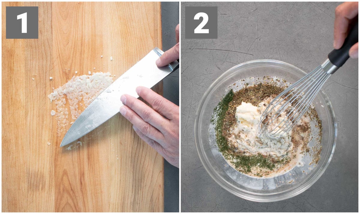 Chopping board with sharp knife crushing garlic into a paste, and a glass bowl with ingredients for salad dressing being whisked.