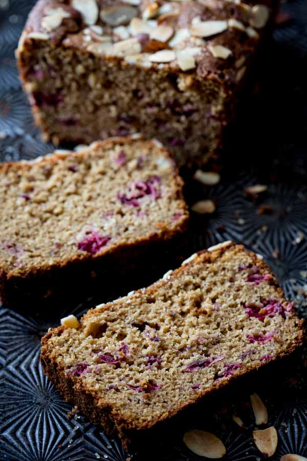 almond cranberry bread slices on counter