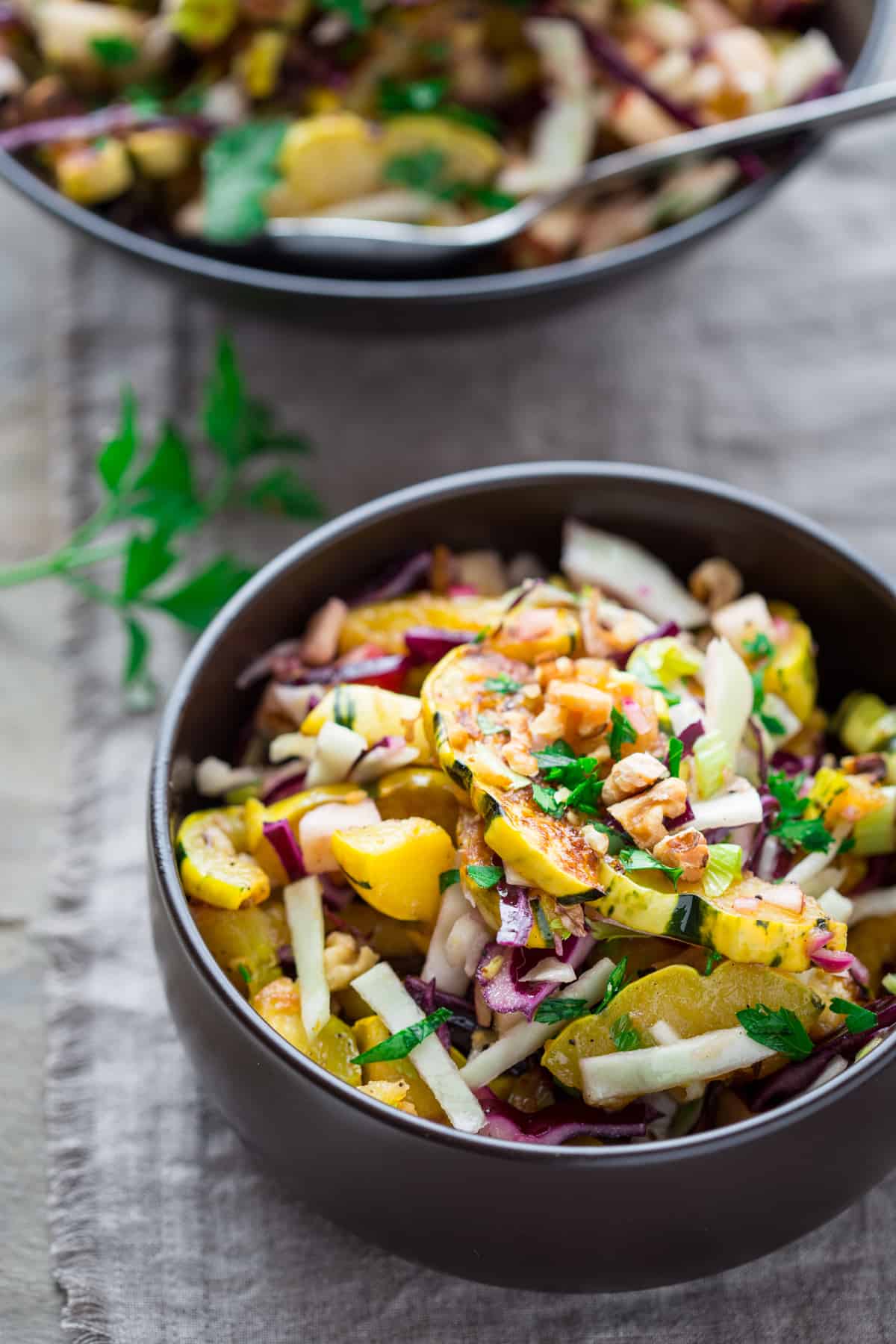 Delicata Salad with Warm Pickled Onion Dressing in a bowl 