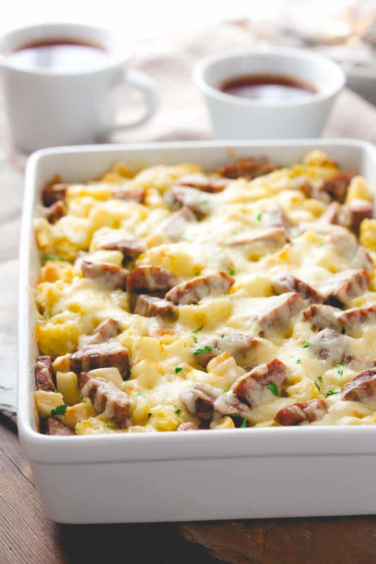 Apple, Cheddar and Sausage Breakfast Strata in a casserole dish 