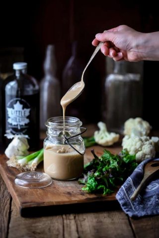 This Maple Tahini Dressing is so good and just in time for Salad Month. It is vegan, gluten-free and paleo. And is ready in just 10 minutes! Healthy Seasonal Recipes | Katie Webster