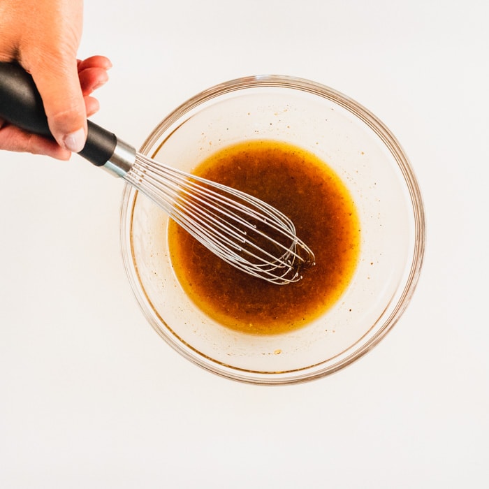 Whisk the dressing ingredients in a bowl