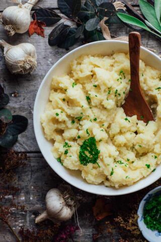 Mashed potatoes on a tablescape with fall foliage