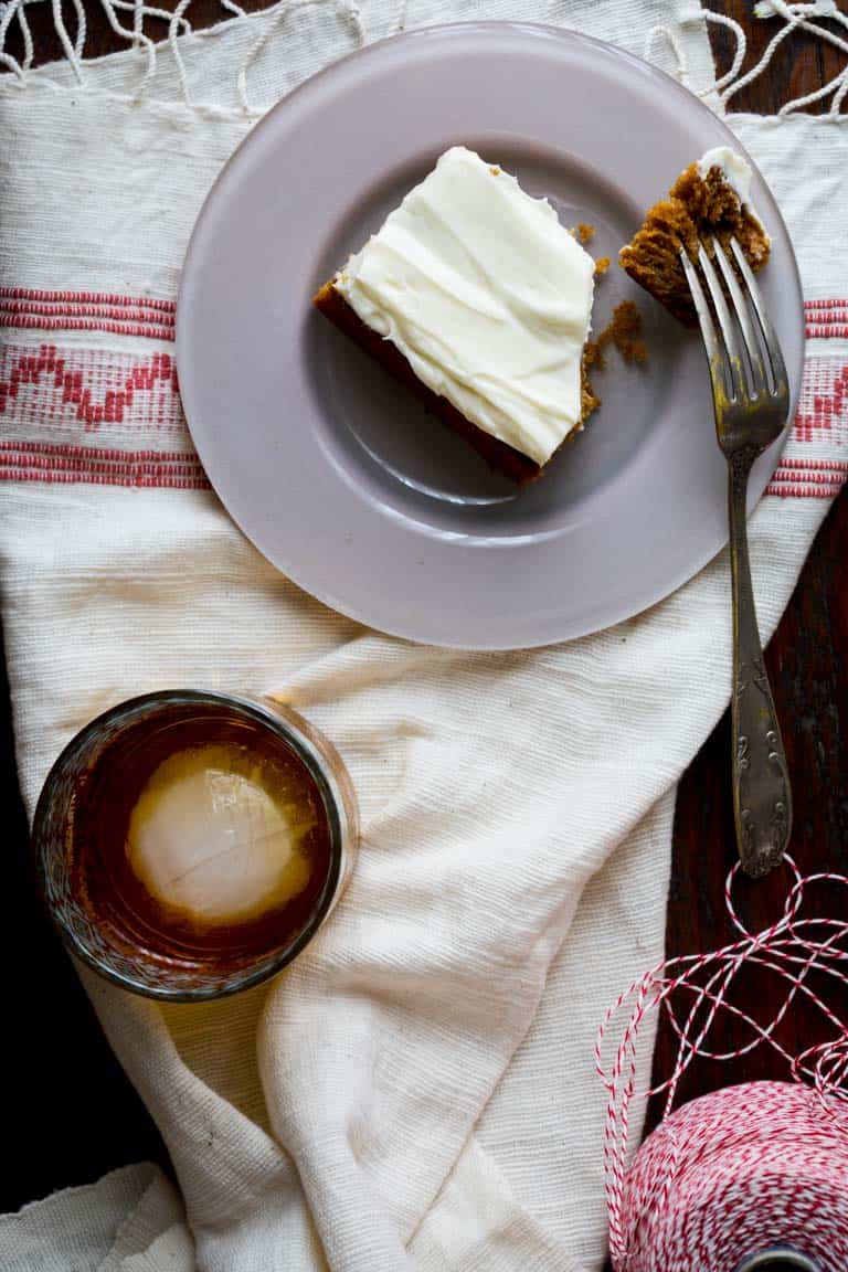 Healthier Gingerbread Sheet Cake with Cream Cheese Frosting for Christmas Dessert. Serves 18 people. Made with pure maple syrup instead of sugar, whole-grain flour, applesauce and lower fat cream cheese. Very moist and so good! | Healthy Seasonal Recipes 