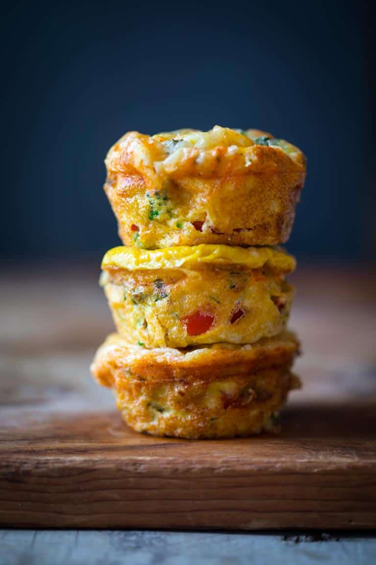 High Protein Grab and Go Veggie Egg Cups stacked on top of each other 