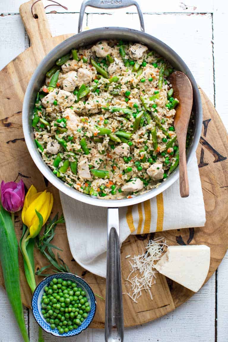 One Pot Chicken and Brown Rice with Spring Veggies. 30 minutes, gluten-free and kid approved! #onepotrecipe #chickenrecipe #healthyweeknight #30minutedinner