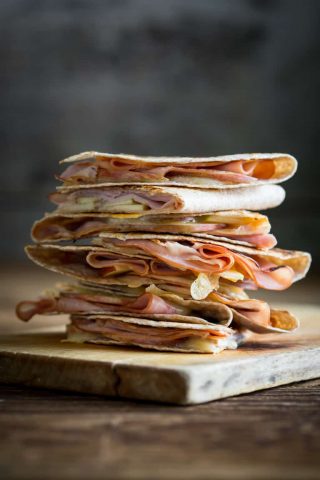 Apple Ham and Cheddar Quesadillas will be every kid's new favorite meal. They are fast and easy and family friendly. Healthy Seasonal Recipes #kidfriendly #weeknight #easyrecipe #apples