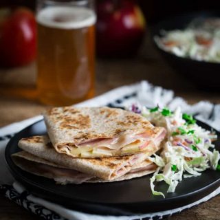 Apple Ham and Cheddar Quesadillas will be every kid's new favorite meal. They are fast and easy and family friendly. Healthy Seasonal Recipes #kidfriendly #weeknight #easyrecipe #apples