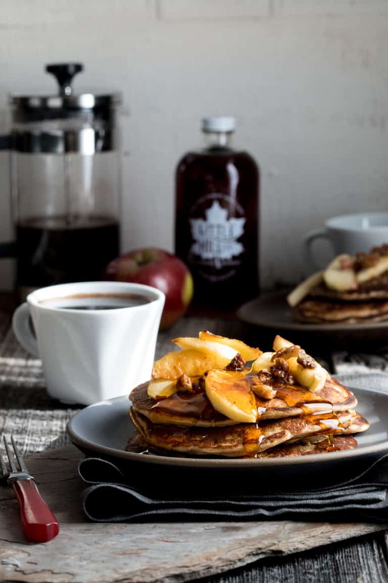Behold, fall on a plate! These gluten-free Apple Protein Pancakes are going to be on your breakfast table for the entire fall season. Mark my words. They are made with oats, cottage cheese, eggs, and apples! You would never guess they don't have any flour in them! They're 106 calories each and have 7 grams protein each.