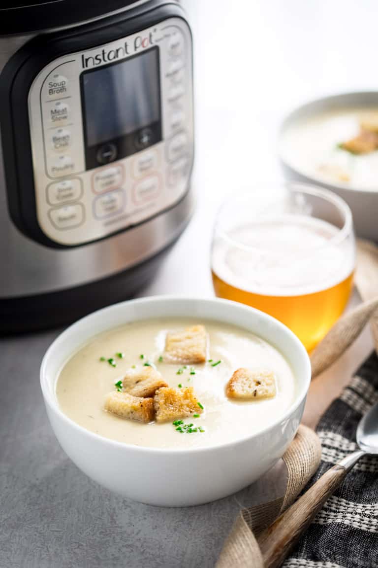 Today's new recipe for Easy Instant Pot Cream of Cauliflower Soup with Sharp White Cheddar Cheese is the first of my new pressure cooker recipes here on Healthy Seasonal Recipes. But if you haven't bought an instant pot yet, there's a slow cooker option as well. The recipe is naturally gluten-free and only 245 calories per cup!Â  #glutenfree #vegetarian #cauliflower #soup #instantpot #pressurecooker