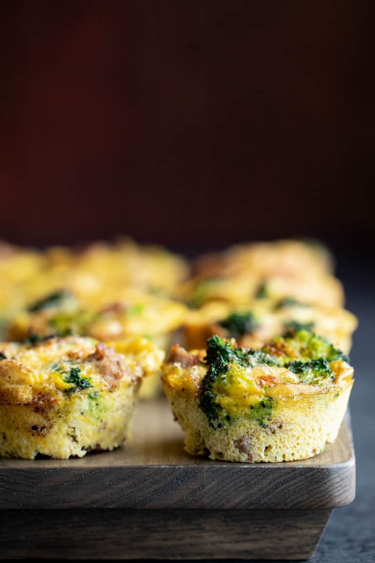 A batch of Paleo Egg Muffins on a gray wooden tray