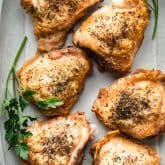 Crispy Skin Chicken on a gray platter