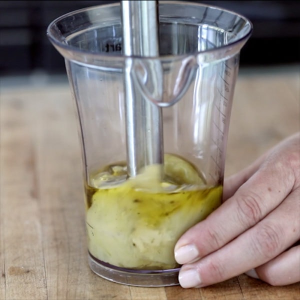 Blending Apple Cider Vinegar Salad Dressing with an immersion blender