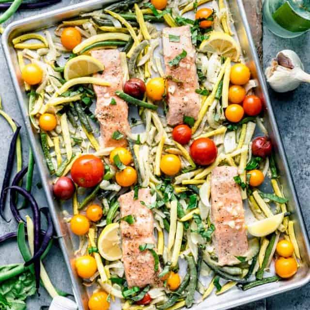 an overhead of sheet pan salmon and vegetables