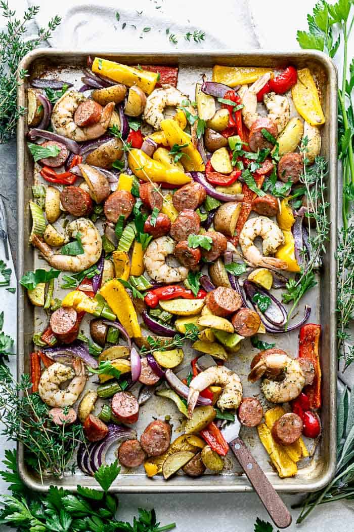 A sheet pan with Shrimp and Sausage with veggies