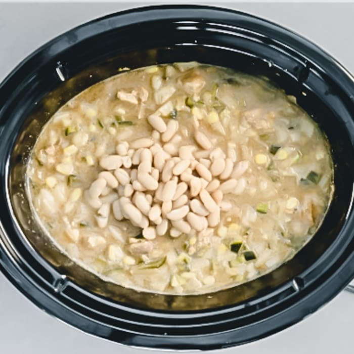 white chili with white beans on top