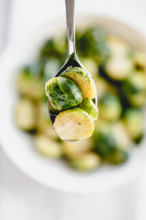 a closeup of a spoonful of Brussels sprouts