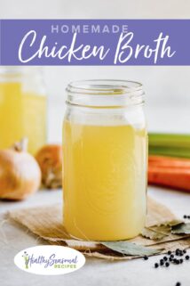 jars of chicken broth with carrots, onions and celery on the work table)