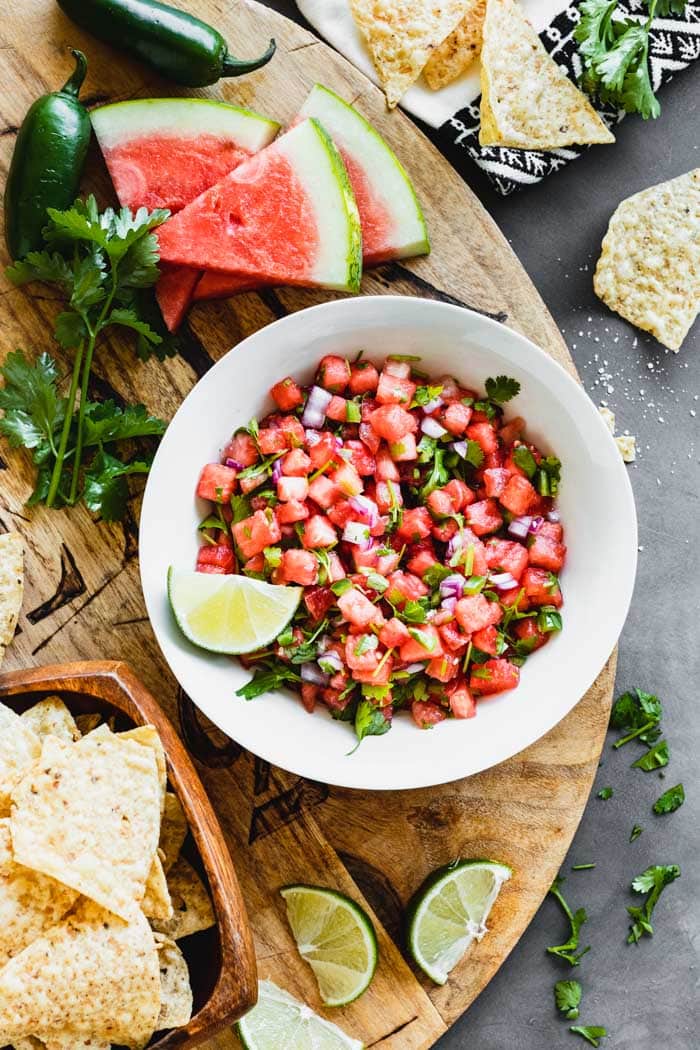 Watermelon salsa overhead with slices of watermelon