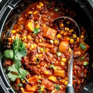 The slow cooker from above with the chili in it