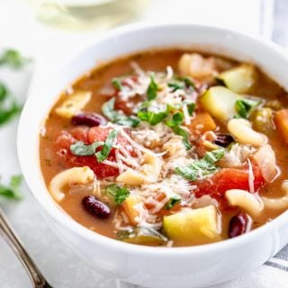 a side view close-up of a bowl of soup