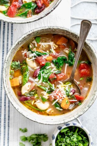 overhead view of instant pot minestrone soup in a circular bowl