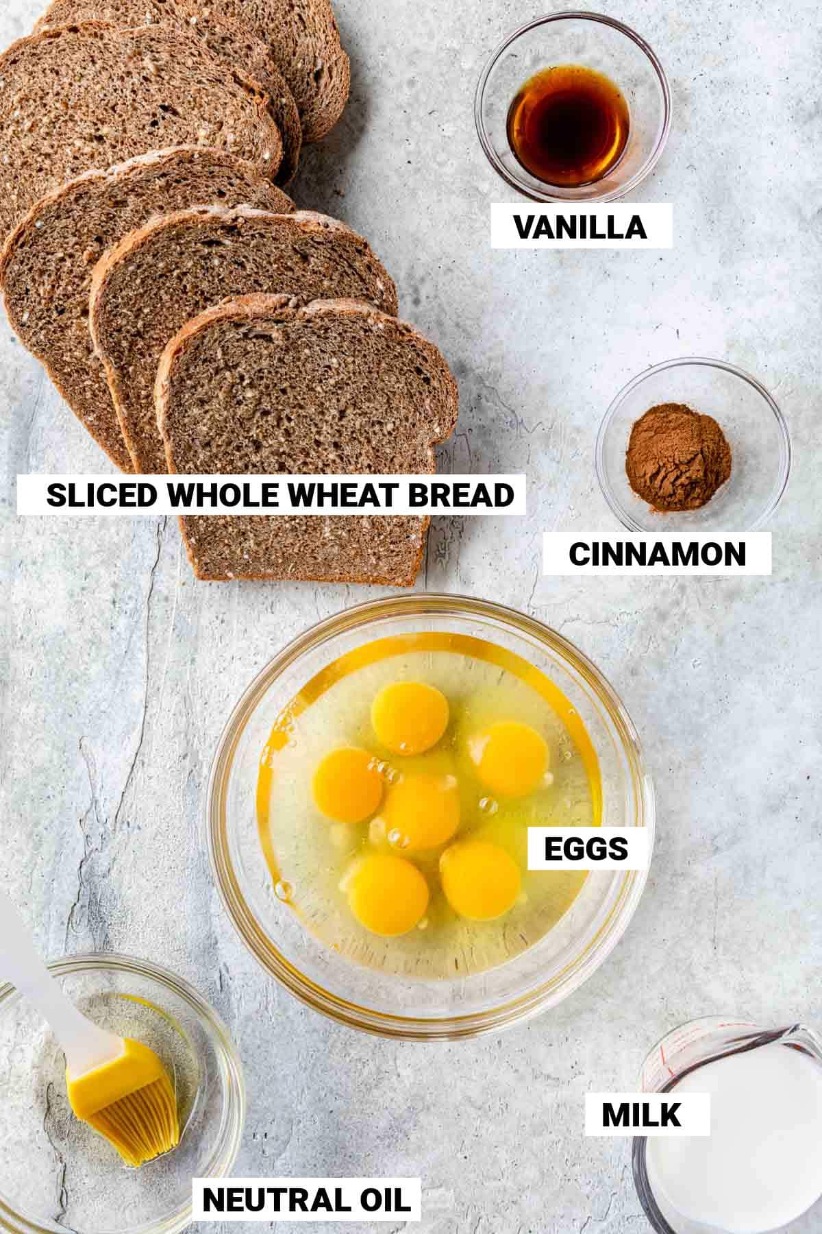 ingredients to make whole wheat french toast on a table