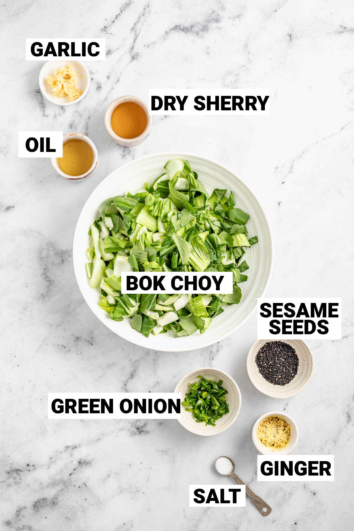 Basic bok choy ingredients including dry sherry, scallions, ginger, garlic, oil and sesame seeds