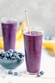 two glasses of blueberry banana smoothies