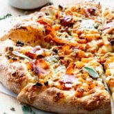 butternut squash pizza on cutting board