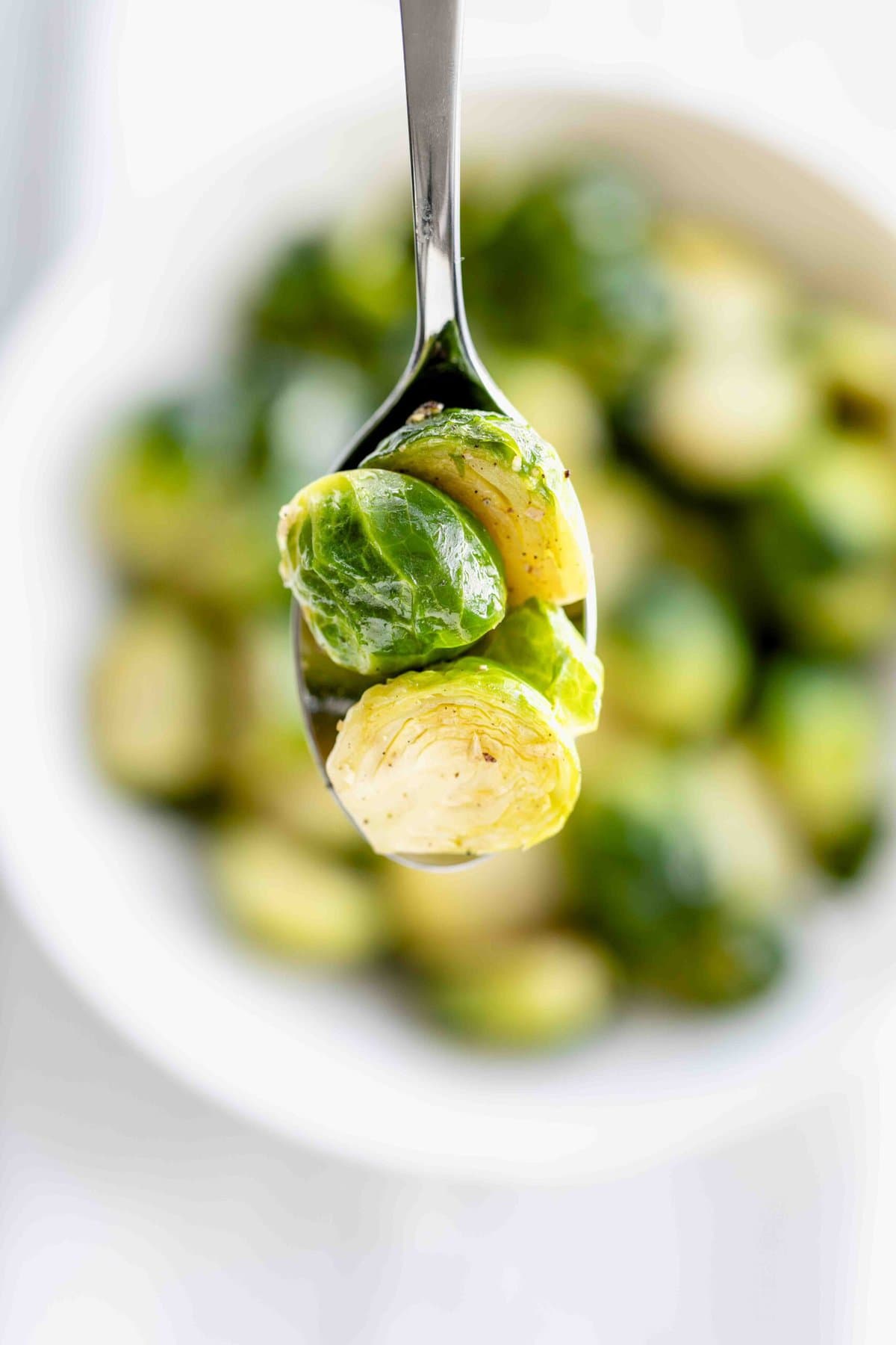 a spoonful of steamed brussel sprouts